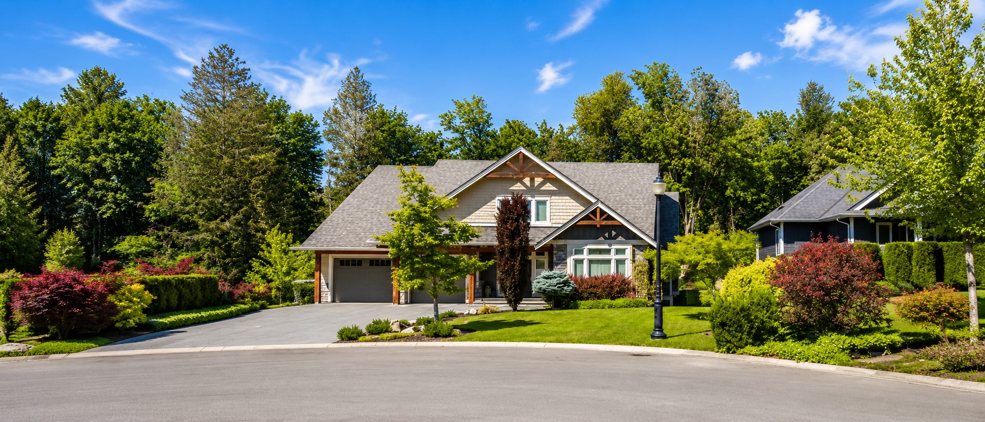Craftsman-style custom home with landscaped yard